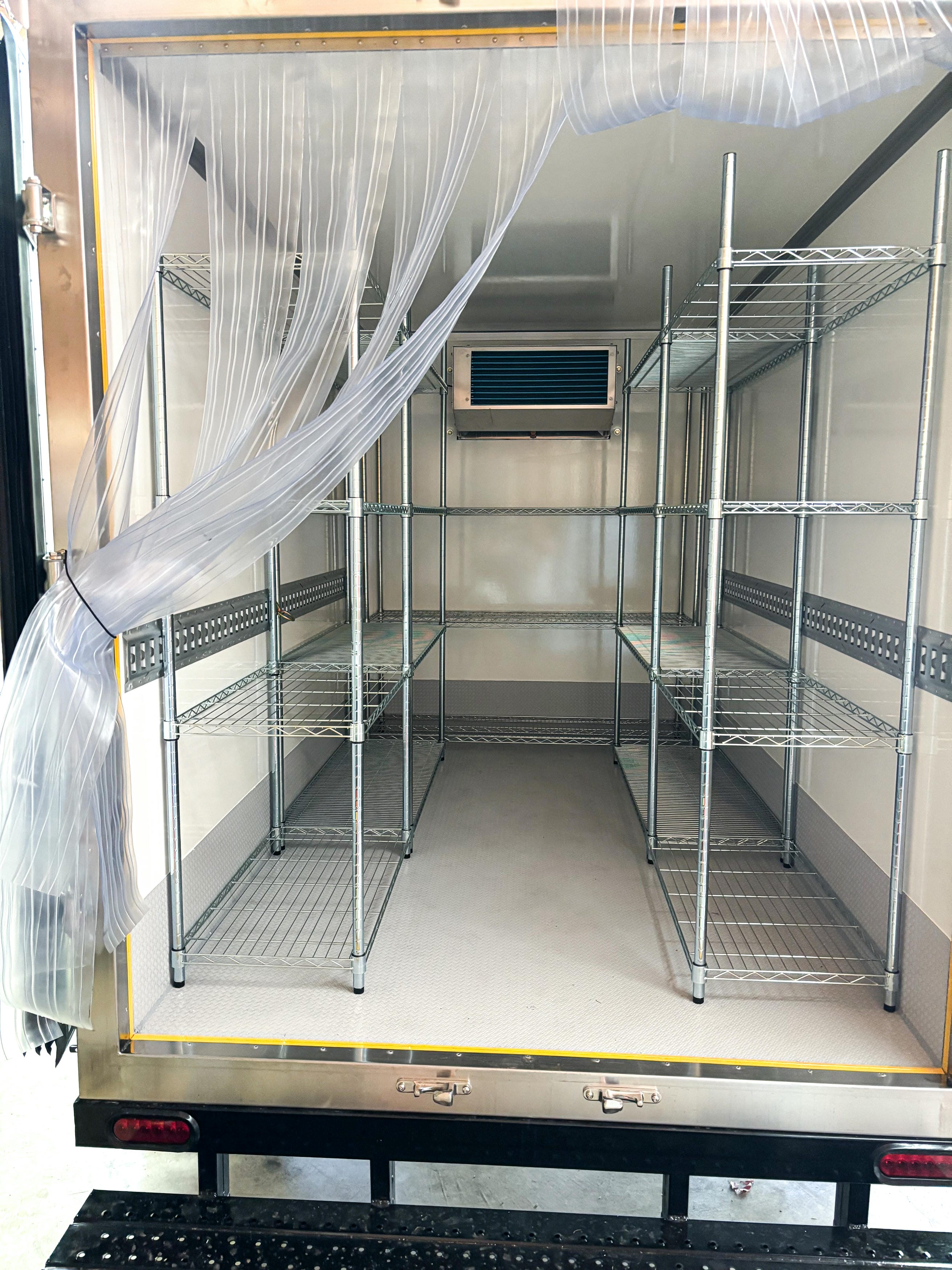 Empty clean refrigerated trailer interior with wire racks for rent Longview WA and Cowlitz County